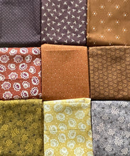 Load image into Gallery viewer, Explore the rustic charm of Kim Diehl’s Quiet Grace fabric collection for Henry Glass Fabrics. This exquisite bundle showcases a harmonious blend of rich greens, deep reds, warm browns, and lustrous golds, each piece radiating with intricate patterns and timeless elegance
