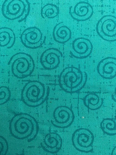 Fit for a Queen Wideback in Betula is a luxurious 100% cotton quilt backing fabric green with green swirls