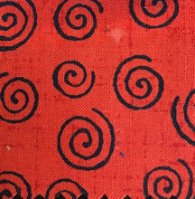 Load image into Gallery viewer, Fit for a Queen Wideback in Betula is a luxurious 100% cotton quilt backing fabric Red with black swirls
