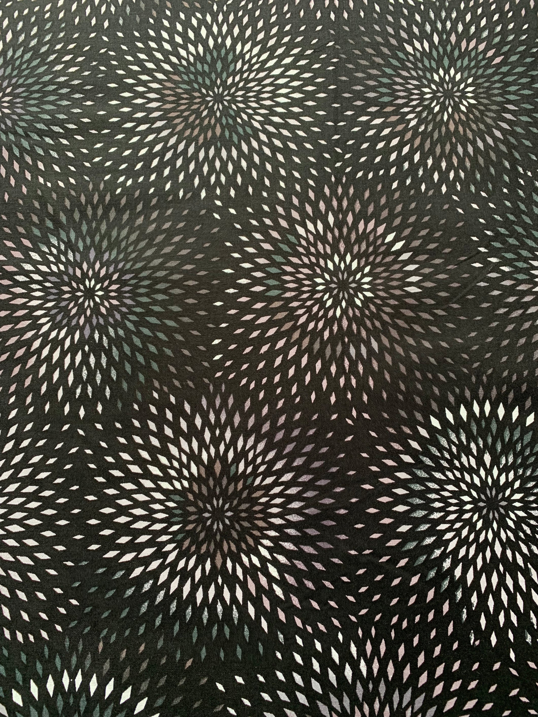 Black background with grey and white  diamonds in mandala pattern on cotton quilting Wideback 